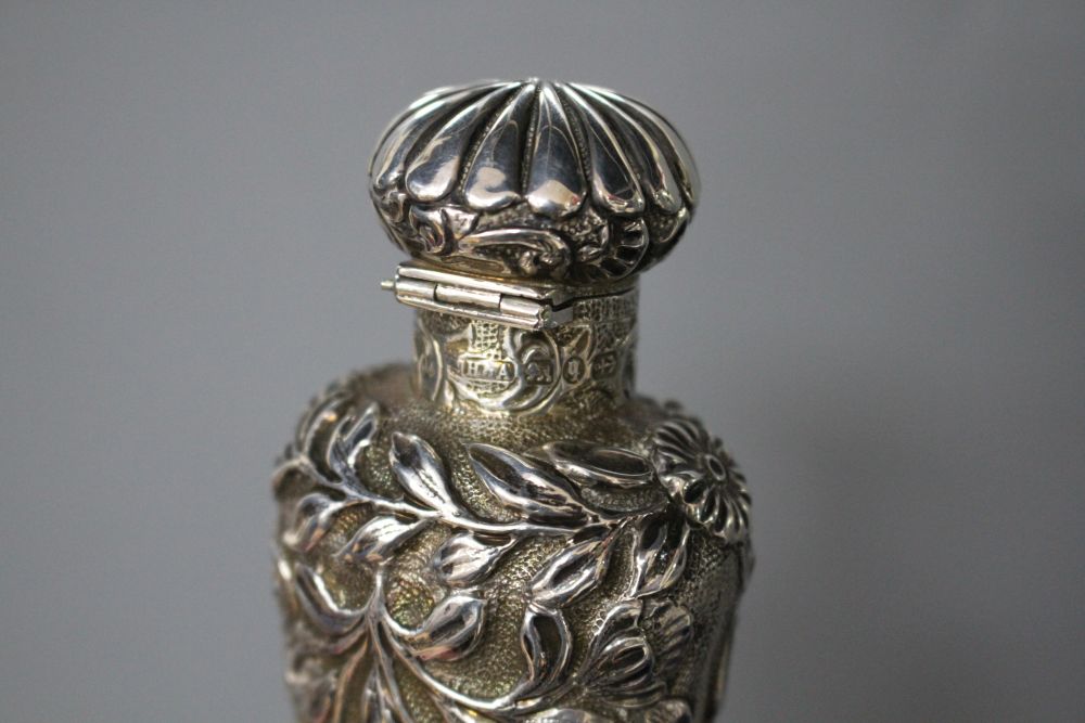 A Late Victorian silver mounted perfume bottle, in Goldsmith & Silversmith box, by Horton and Allday, Birmingham 1890